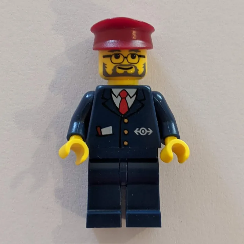 Conductor - Dark Blue Jacket, Dark Blue Legs, Dark Red Hat, Glasses, Beard