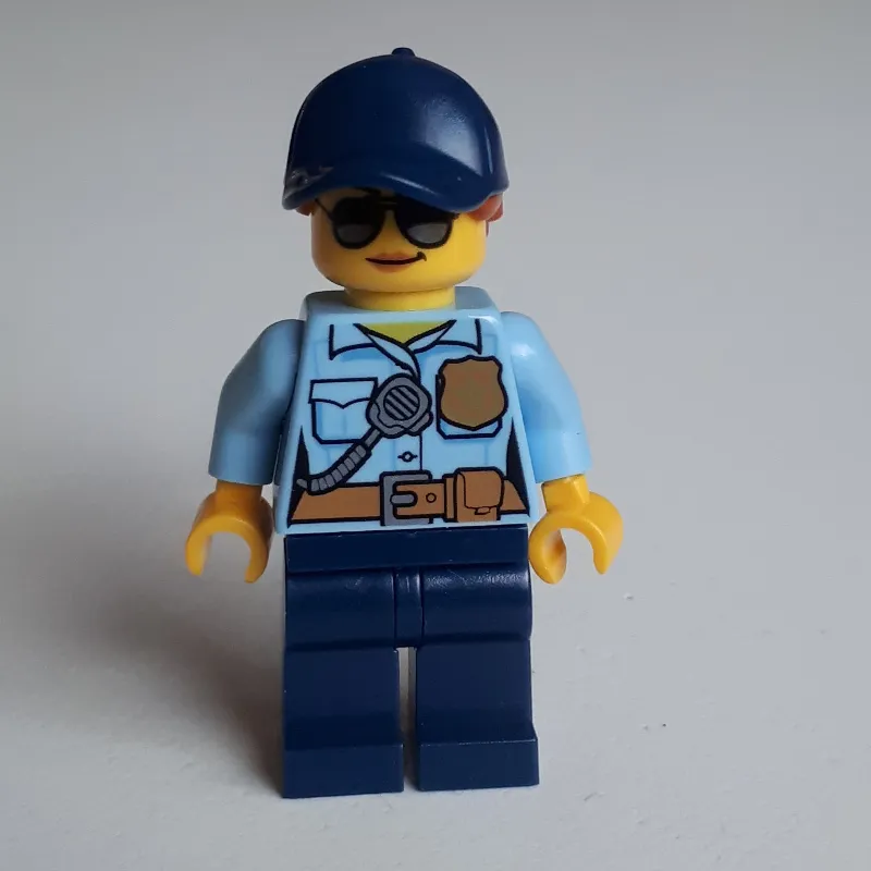 Policewoman, Bright Light Blue Shirt with Radio and Badge, Dark Blue Legs, Dark Blue Cap with Hair, Sunglasses