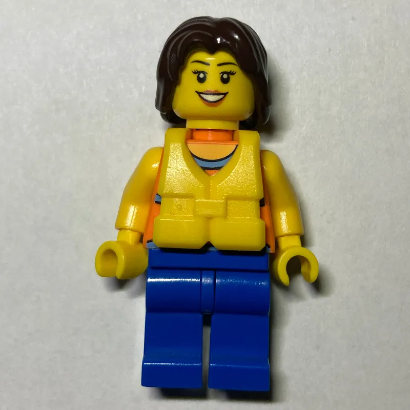 Woman, Orange Halter Top with Flowers, Blue Legs, Yellow Life Vest, Dark Brown Hair