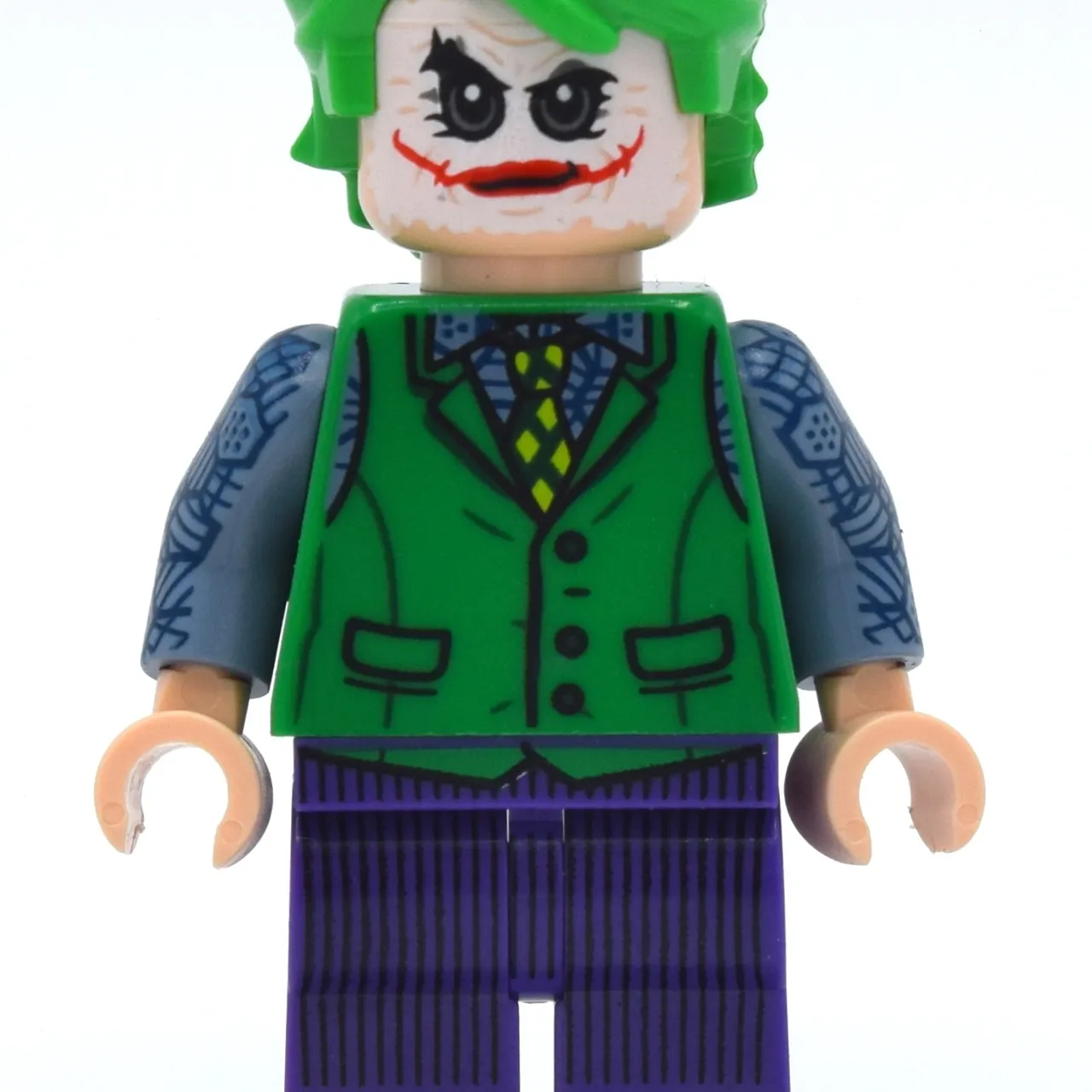 The Joker with Green Vest and White Face Make-up (Dark Knight Trilogy)