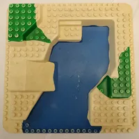 Duplo Baseplate Raised 24 x 24, with Straight Ramp and Blue Pond, with Green Print