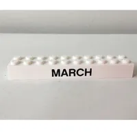 Brick 2 x 10 with Black 'MARCH' / 'APRIL' Print